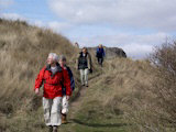 Approaching the Sea View Farm car park with a war time Pill Box in the background.