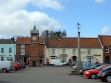 Wainfleet Market place with 'Buttercross' and Clock Tower.