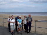 Our group on Winthorpe sea front with Inner Dowsing off-shore wind farm in background.